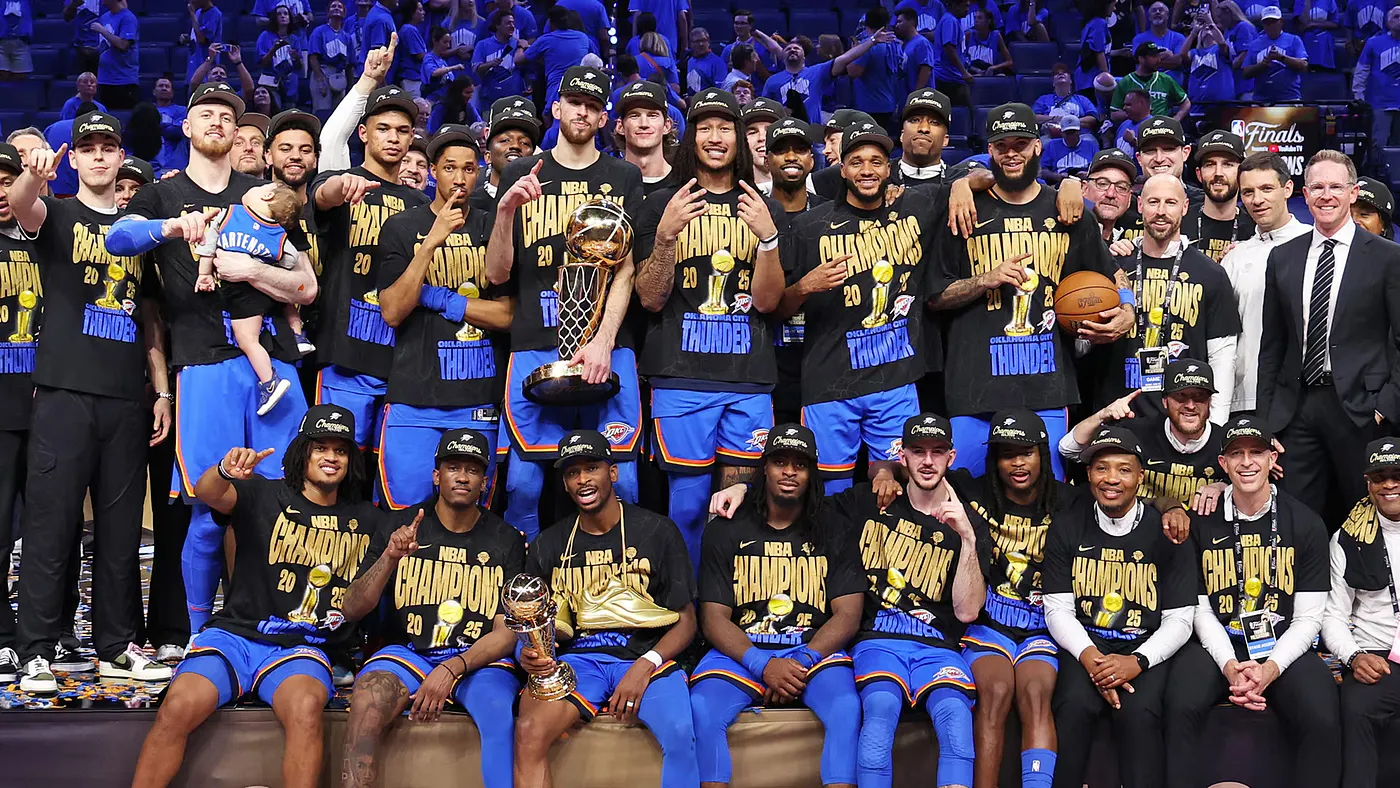 Oklahoma City Thunder players celebrating their 2024-25 NBA Championship victory.